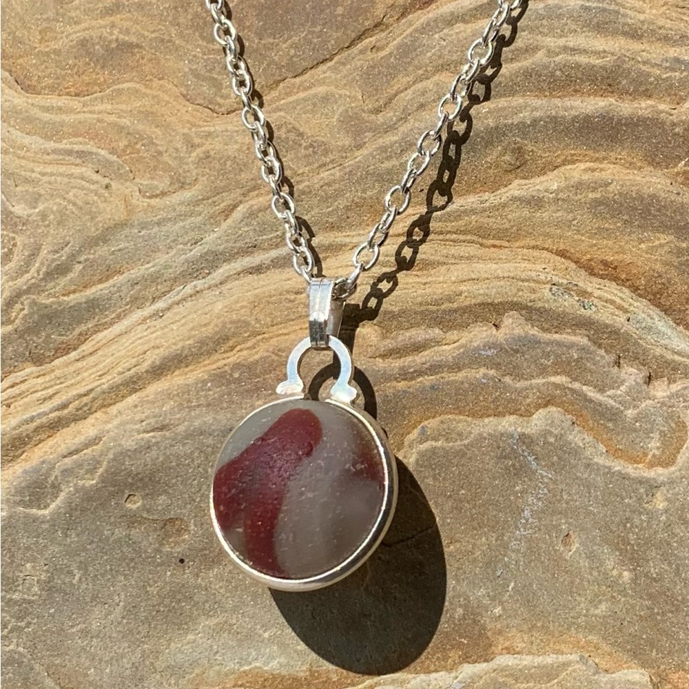Genuine Lake Erie beach glass marble.